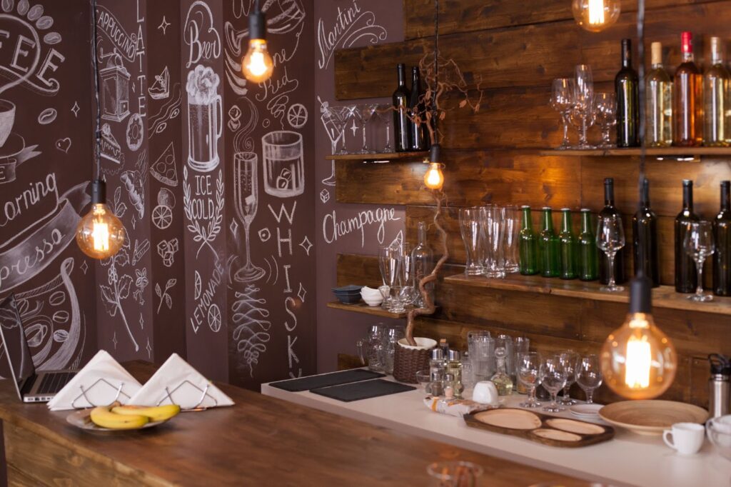 Bar interior design with artistic drawing in the back