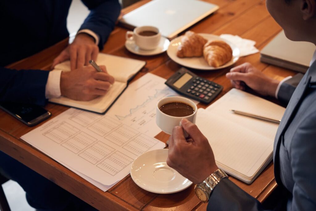 Business people working in a cafe