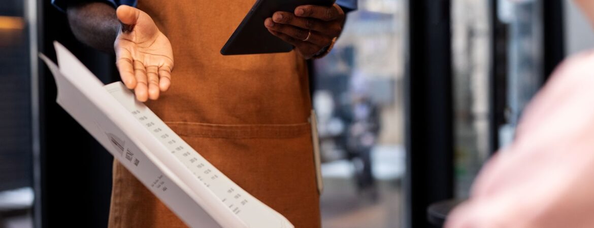 Person ordering food at restaurant