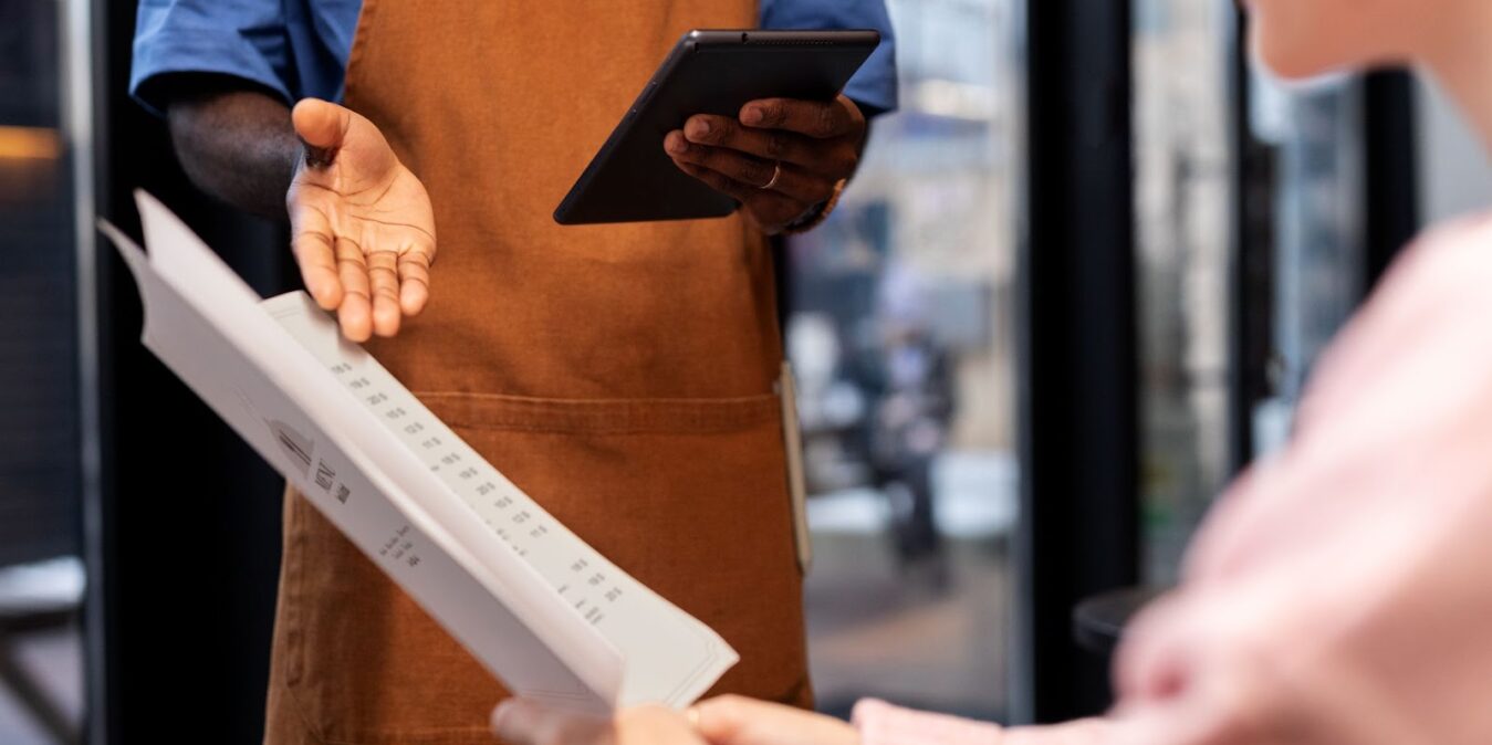 Person ordering food at restaurant